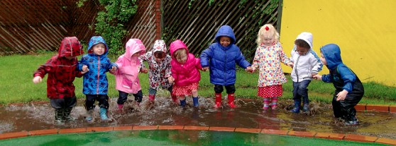 Children Smashing Puddles