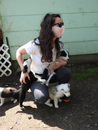 Kaitlin with puppies